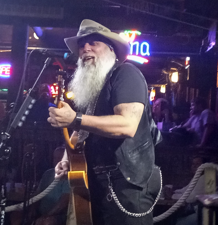 Dallas Moore performing at the FloraBama